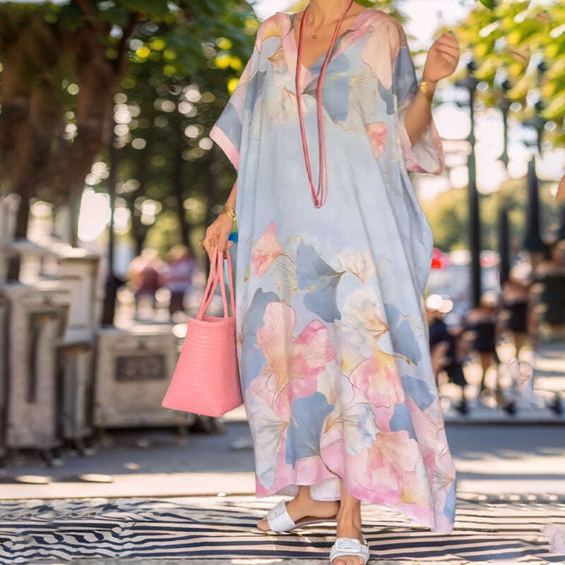 Vestido longo solto com meia manga e flores