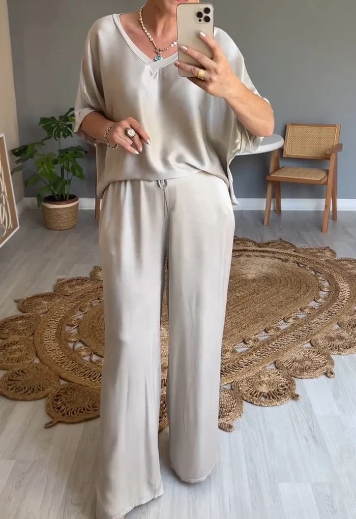 Vestidos de mulher de tamanho grande com decote em V de cor sólida e moda casual