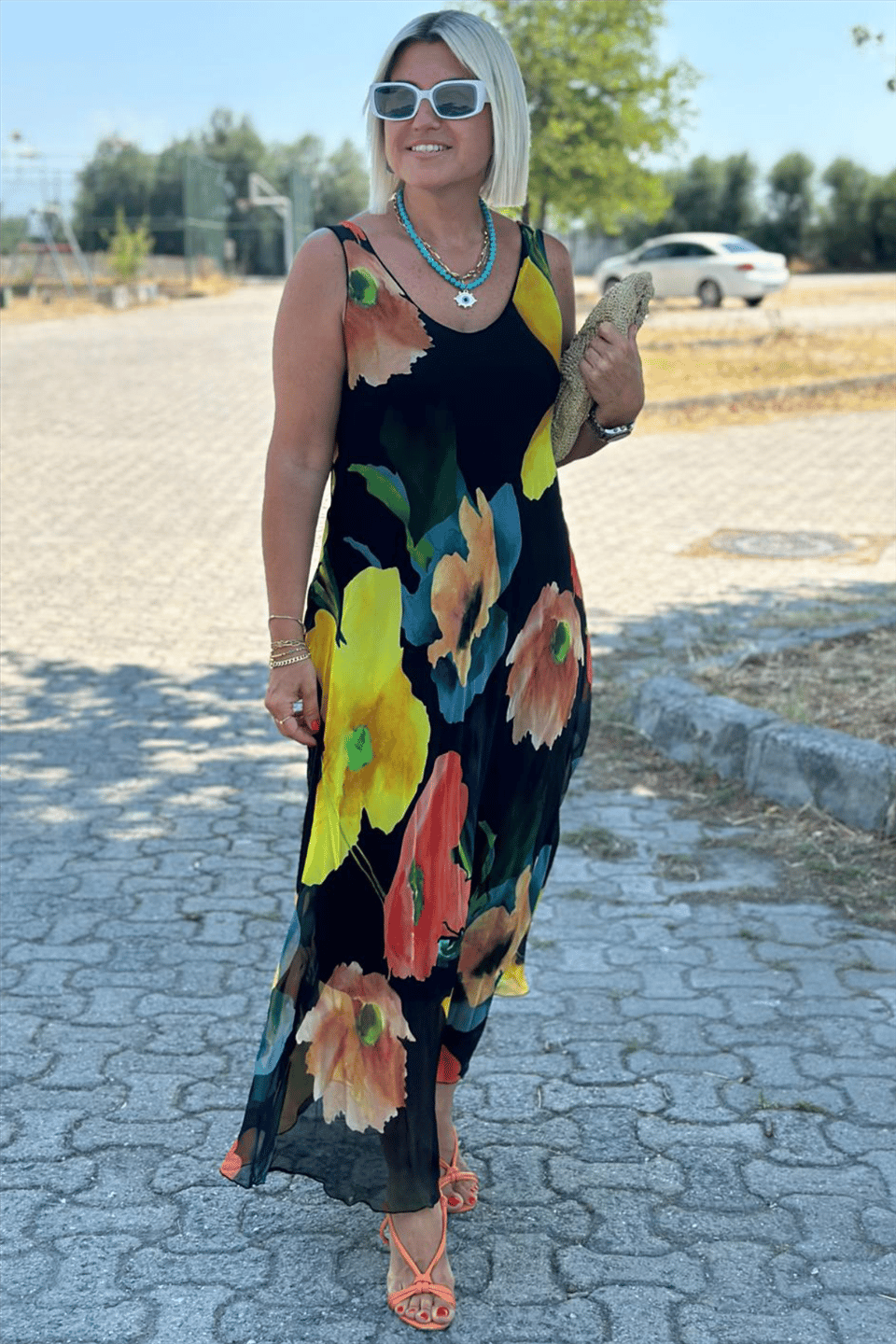 Vestido longo de seda chiffon com decote em U e estampa floral