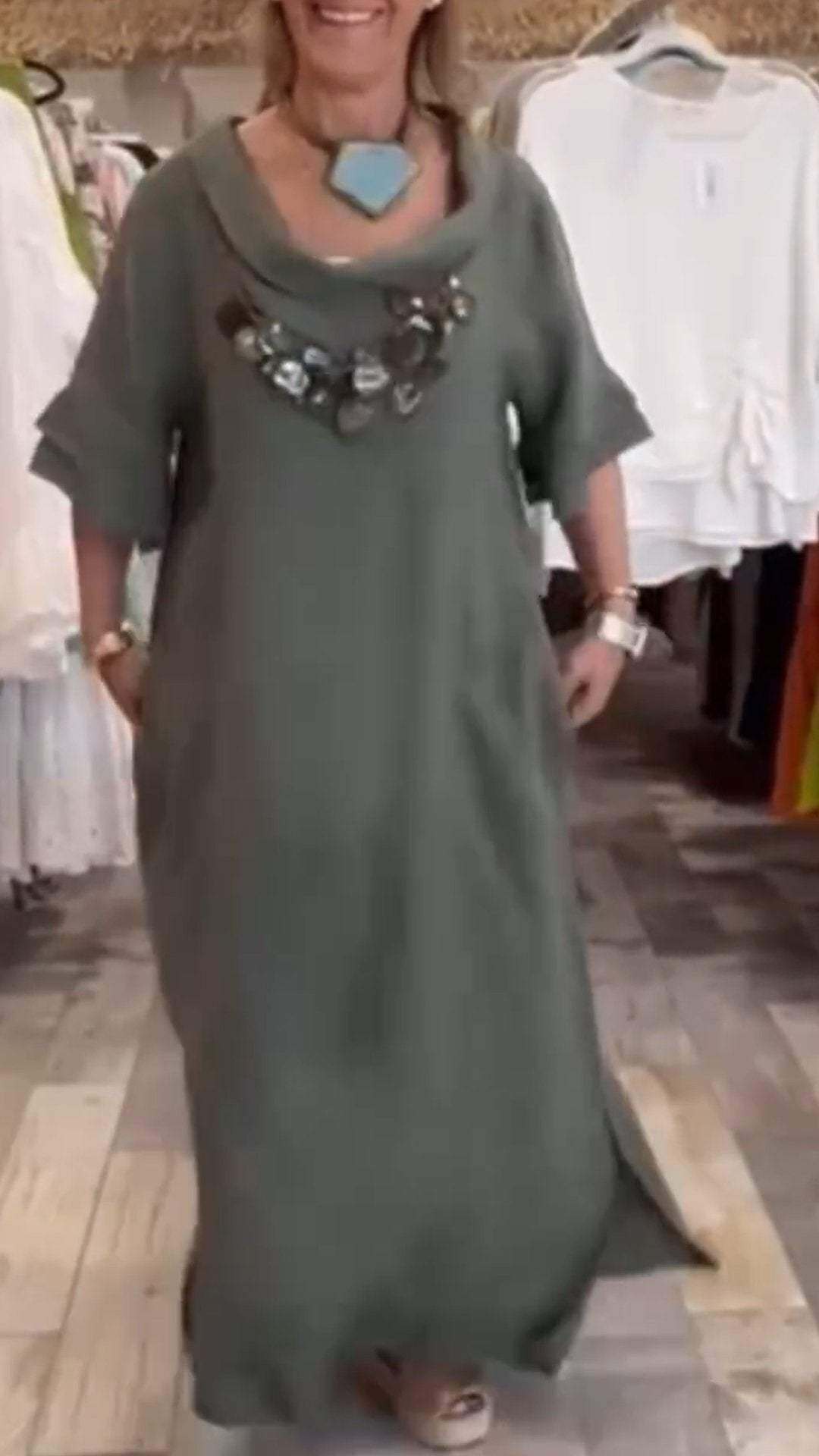 Vestido feminino de algodão e linho com decote redondo e manga média