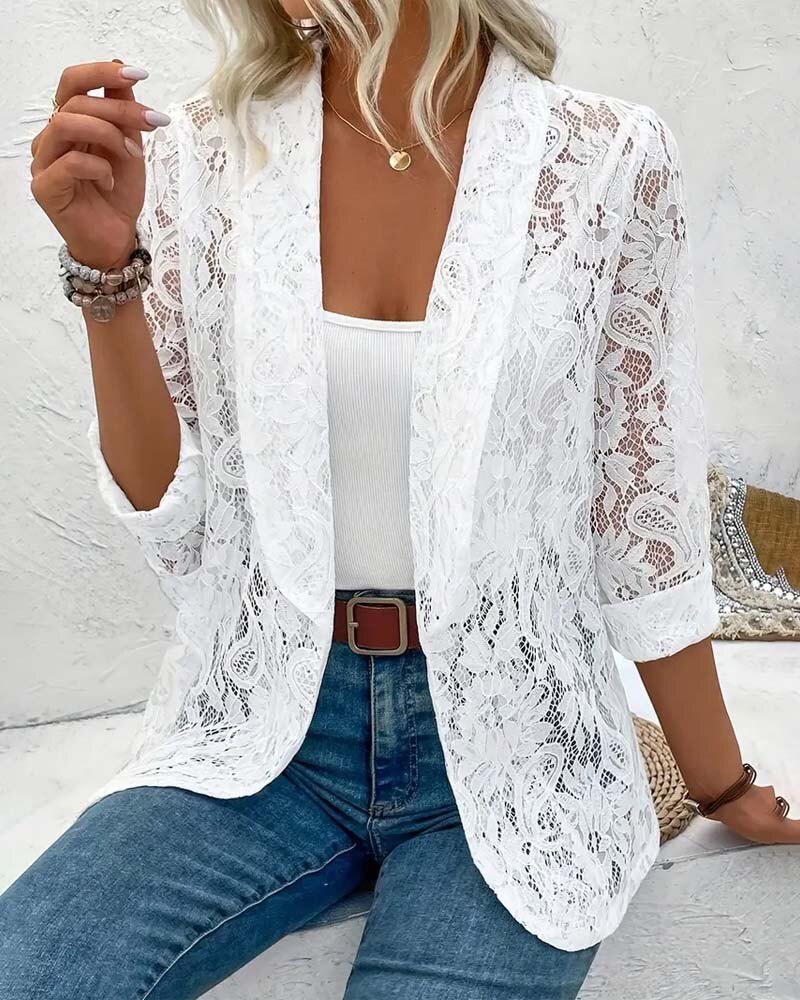 Cappotto elegante tinta unita con pizzo floreale e revers