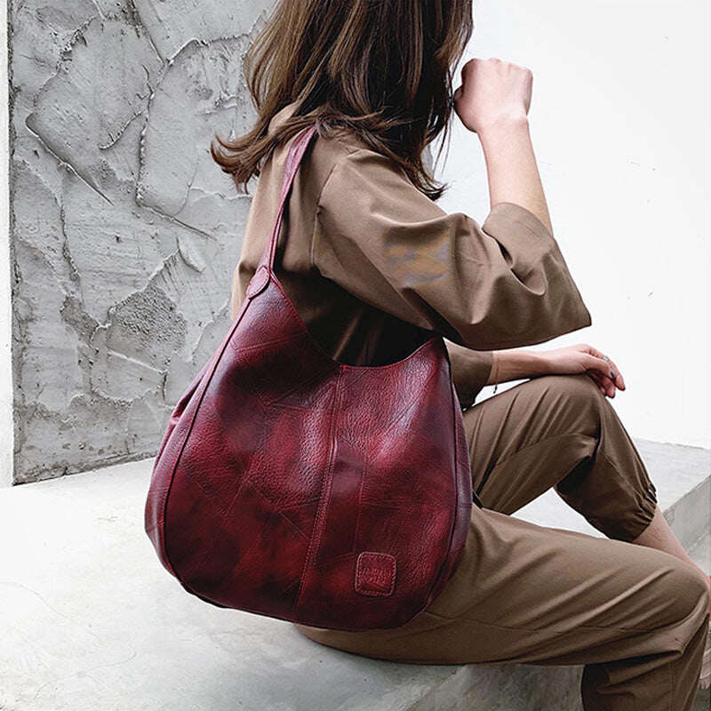 【🎊Novos produtos de 2025】👜Bolsa de ombro feminina retrô de couro macio, grande capacidade