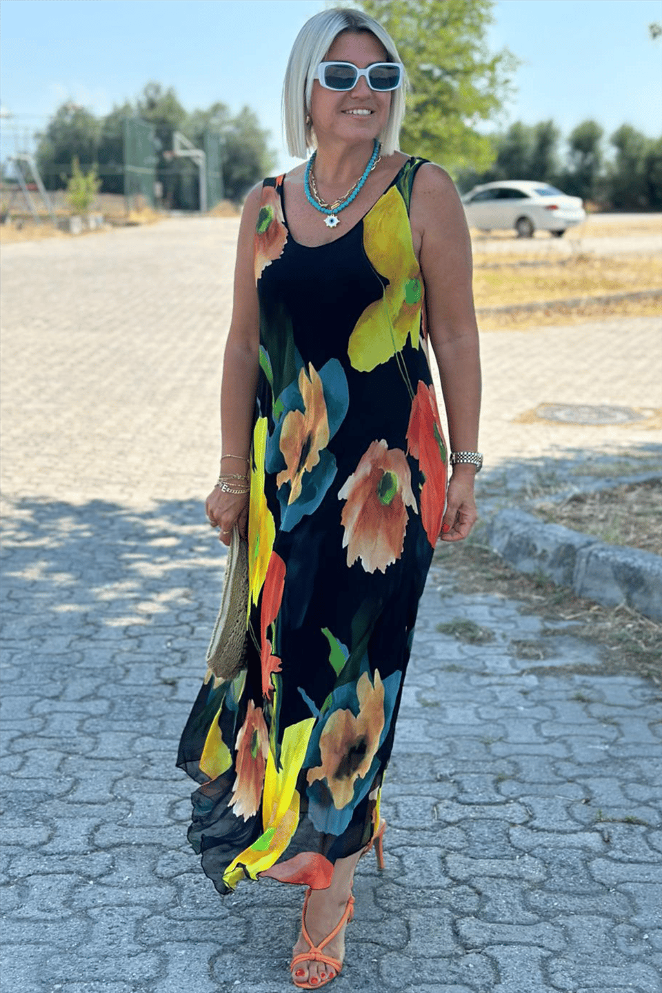 Vestido longo de seda chiffon com decote em U e estampa floral