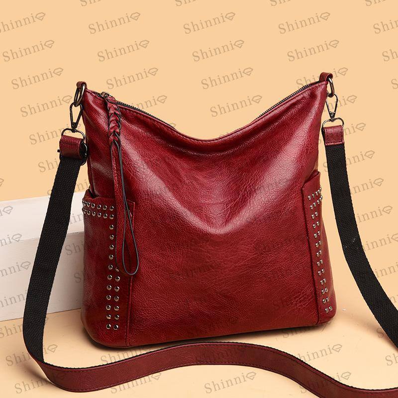 Bolsa de ombro feminina simples elegante com rebites