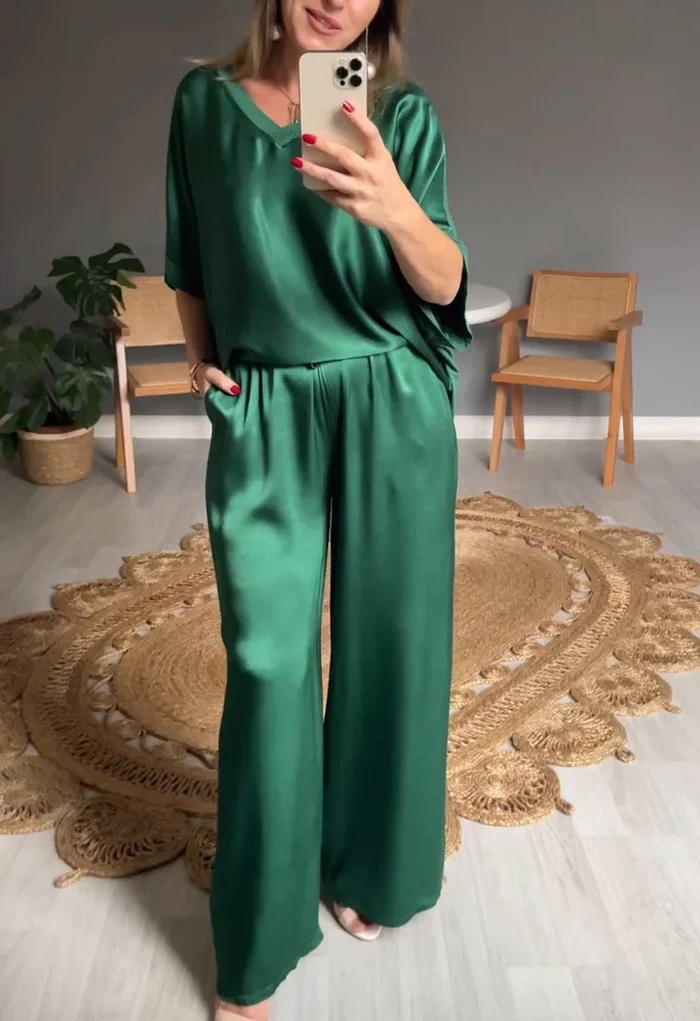 Vestidos de mulher de tamanho grande com decote em V de cor sólida e moda casual