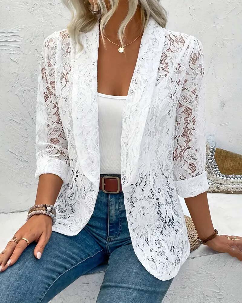 Cappotto elegante tinta unita con pizzo floreale e revers